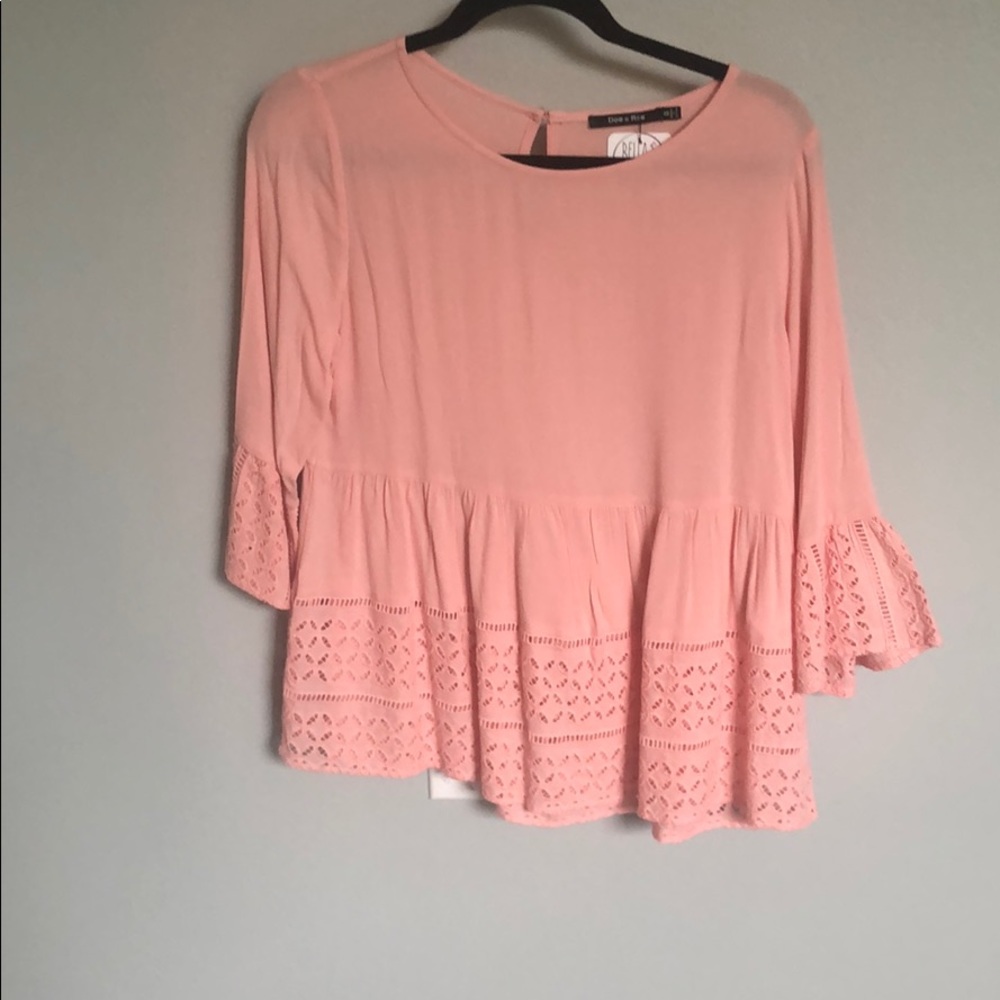 Pink peplum.